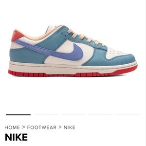 Nike Dunk Lows - Next Nature. Blue and Cream Sneakers with Red Accents